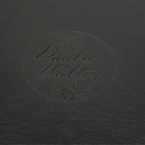 Personalização a laser na capa, com o custo de R$ 60,00.